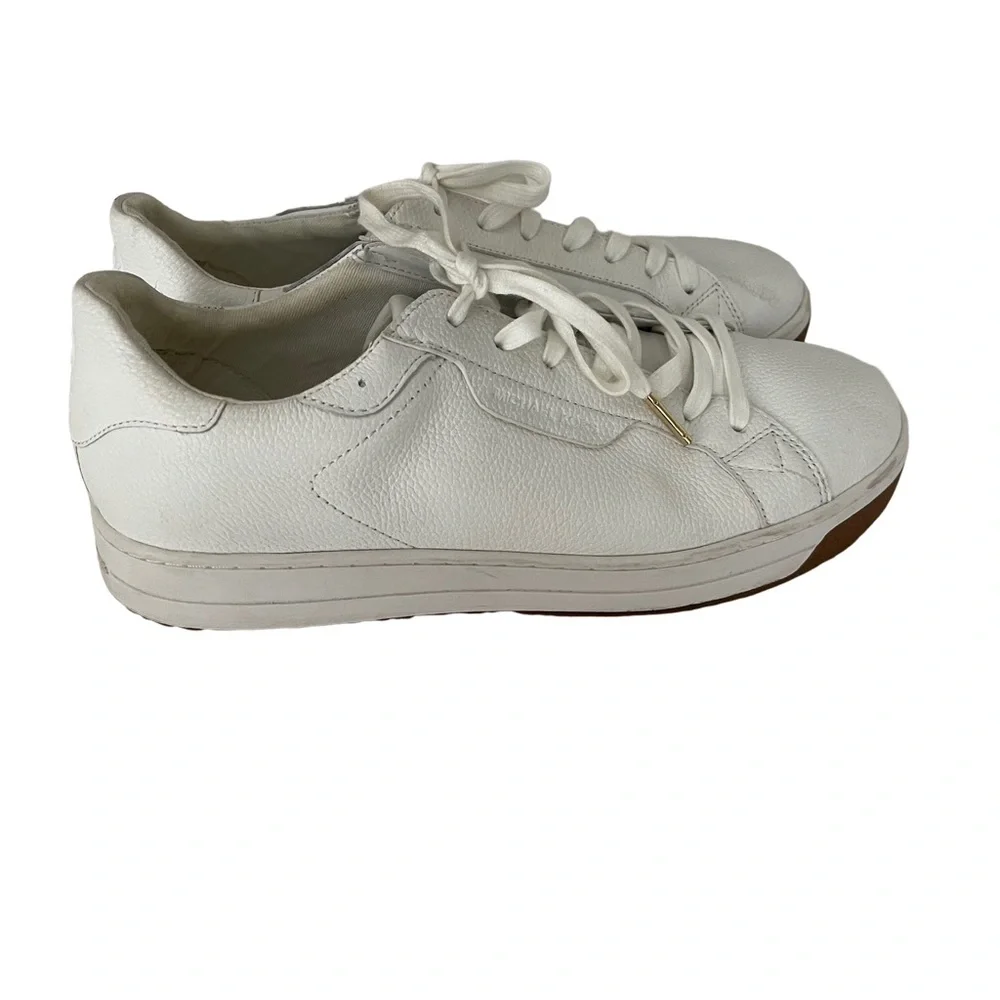 Michael Kors White Leather Sneakers & tennis shoes. Like new. Size 9.5